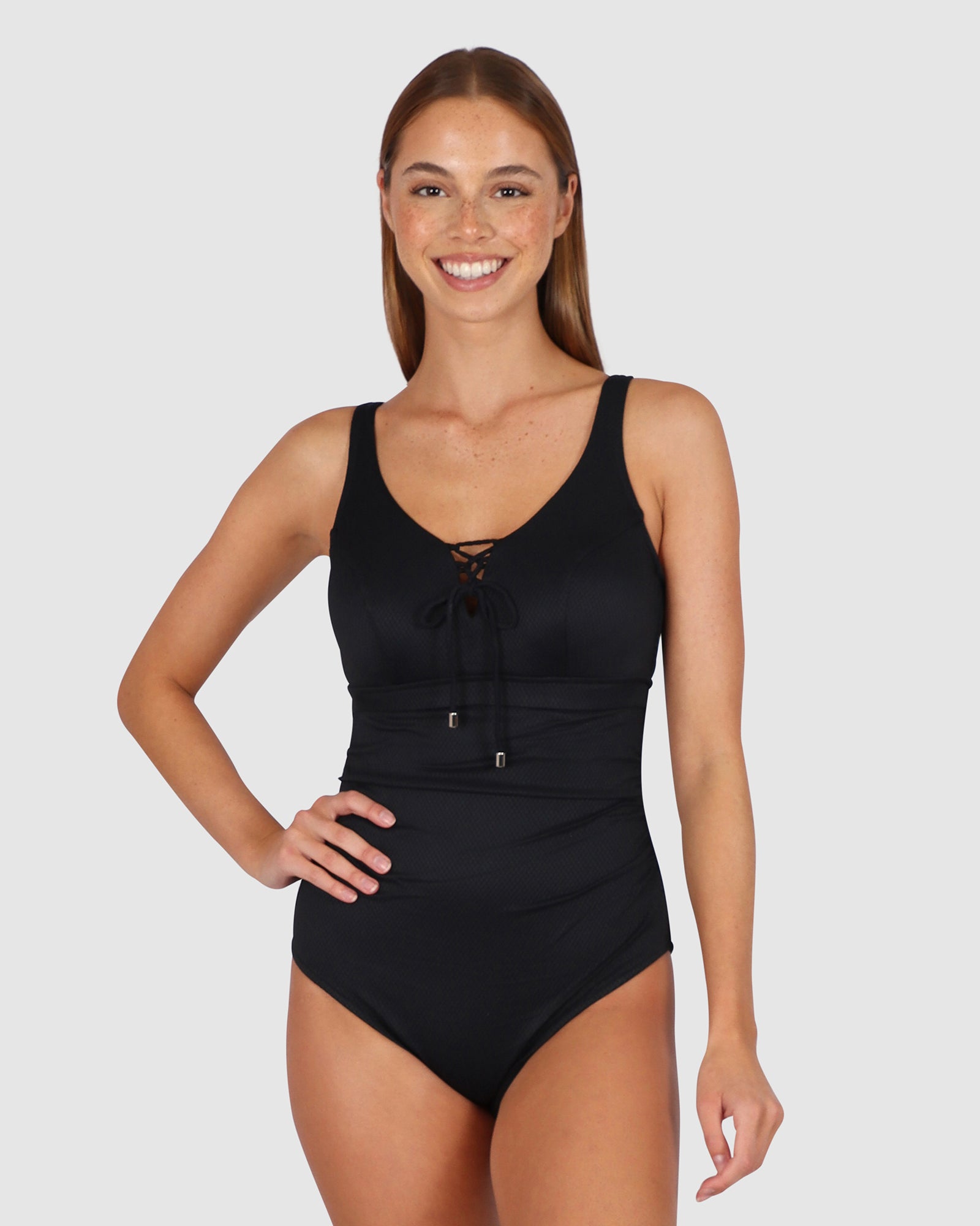 Baku is a premium Australian swimwear brand. The Rococco E-F-G One Piece Swimsuit in Nero, a sleek and classic black, provides sculpting support and timeless style. Featuring a lace-up front neckline, hidden underwire with power mesh stability, boning, and Lycra cup support, this suit also includes tummy control, adjustable and convertible straps, and a clip back for a secure, flattering fit.