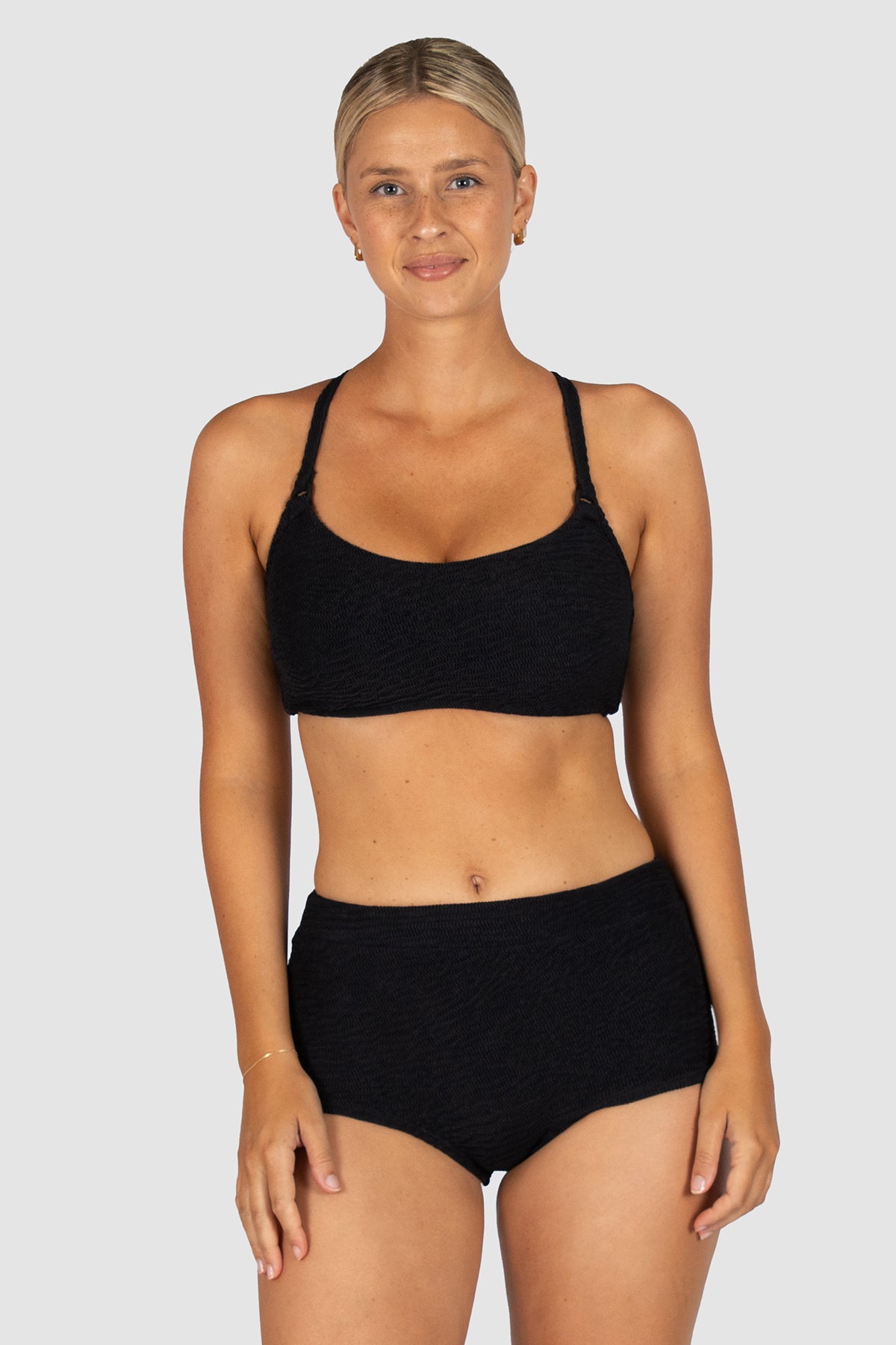 biza E–F Cup Bralette Bikini Top in black crinkle fabric designed with boning support, inner lycra cup, soft removable cups, multiway adjustable straps, and clip-back fastening by Australian swimwear