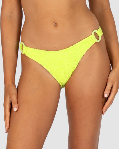Ibiza Ring Side Hipster Bikini Bottom in zest crinkle fabric with dipped waist, side ring detail, and regular coverage from Australian swimwear brand Baku.