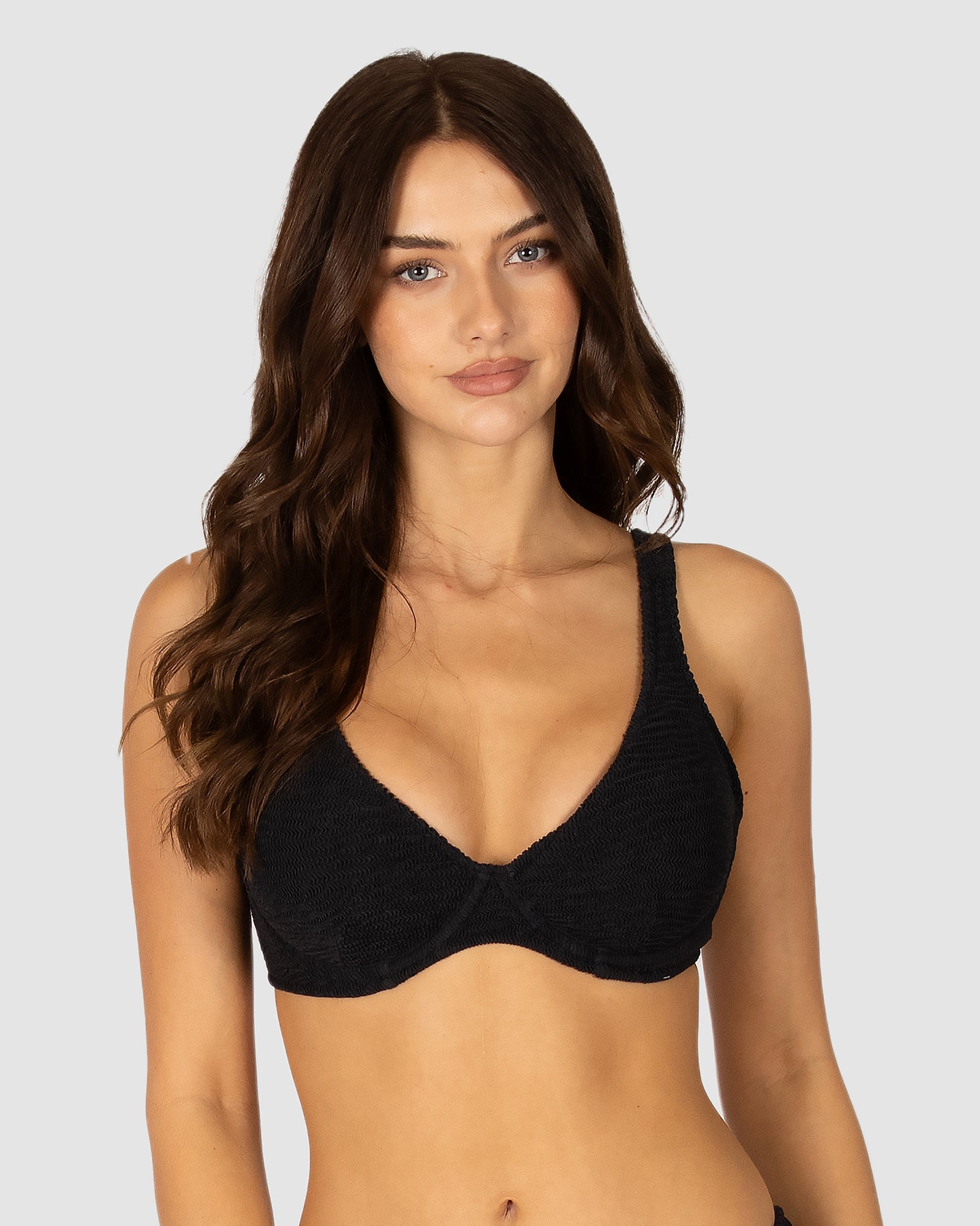 Ibiza DD–E Underwire Bra Bikini Top in black crinkle fabric designed with underwire support, soft removable cups, versatile adjustable straps, and clip-back fastening by Australian swimwear brand Baku.