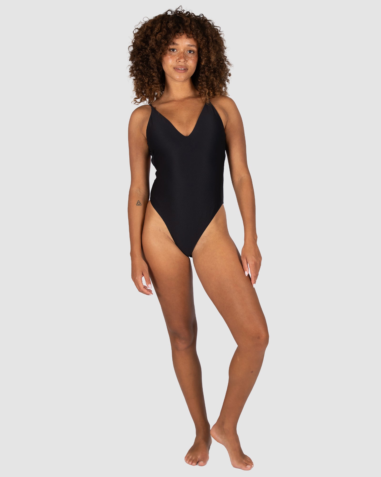 Baku Rococco deep V one piece swimsuit with cheeky coverage, soft removable cups, low back and cross-back detailing – sculpting solid fabrication