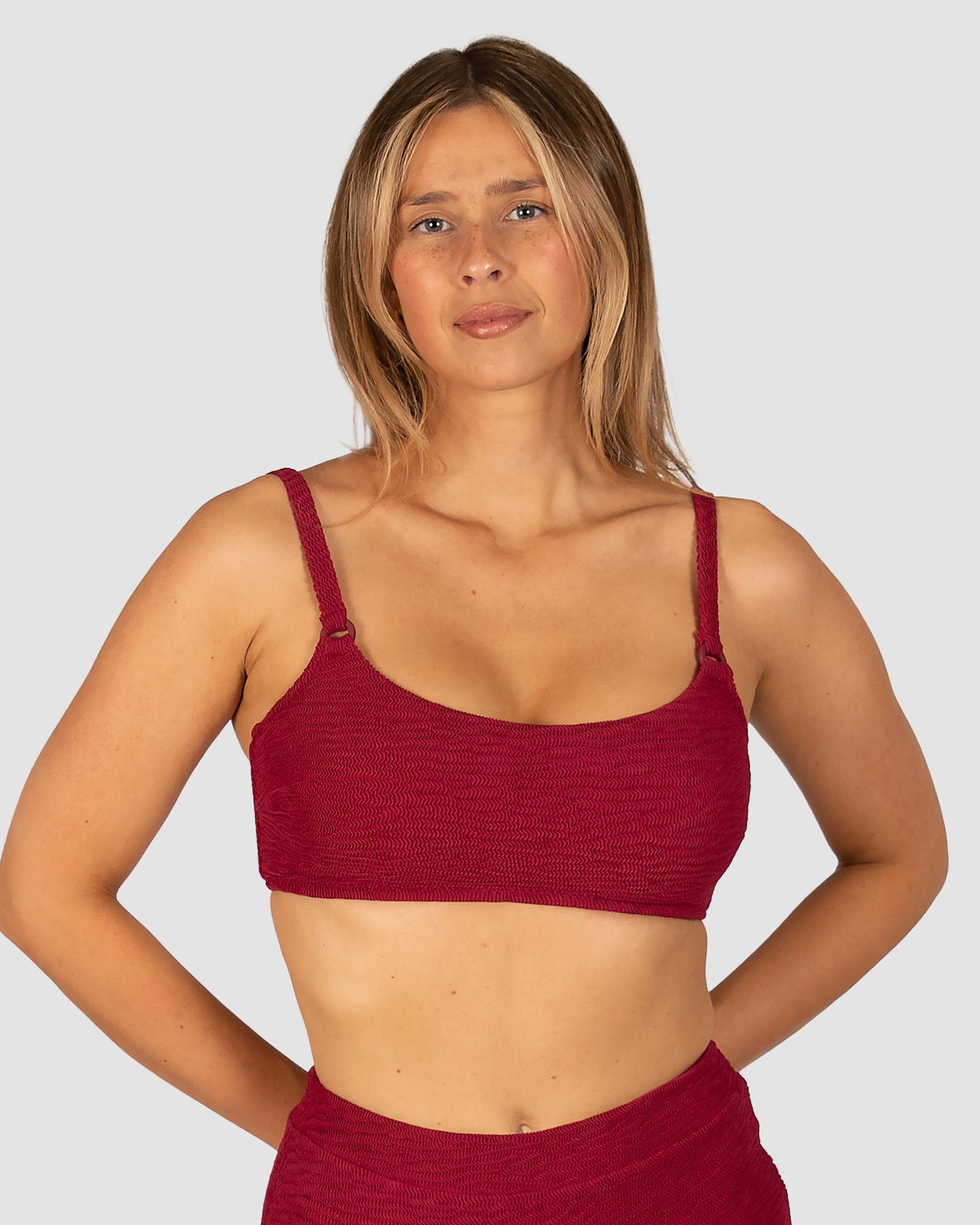 Ibiza E–F Cup Bralette Bikini Top in scarlet crinkle fabric with inner lycra support, boning, removable cups, and versatile convertible straps with clip-back closure from Australian swimwear brand Baku.