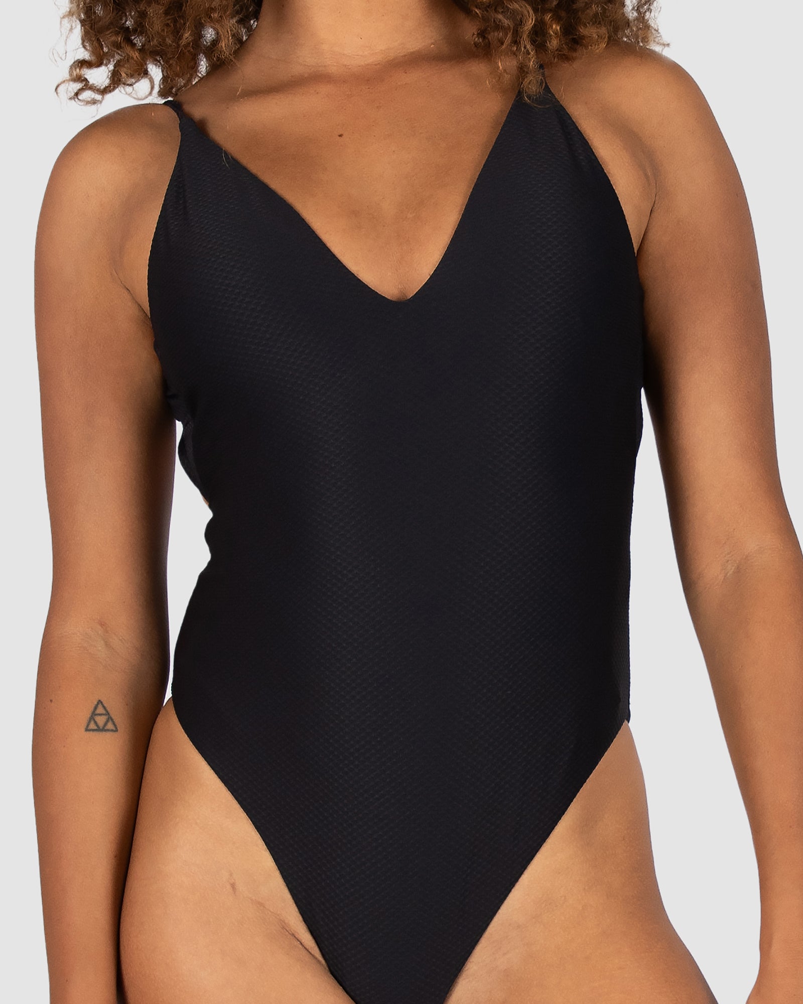 Baku Rococco deep V one piece swimsuit with cheeky coverage, soft removable cups, low back and cross-back detailing – sculpting solid fabrication