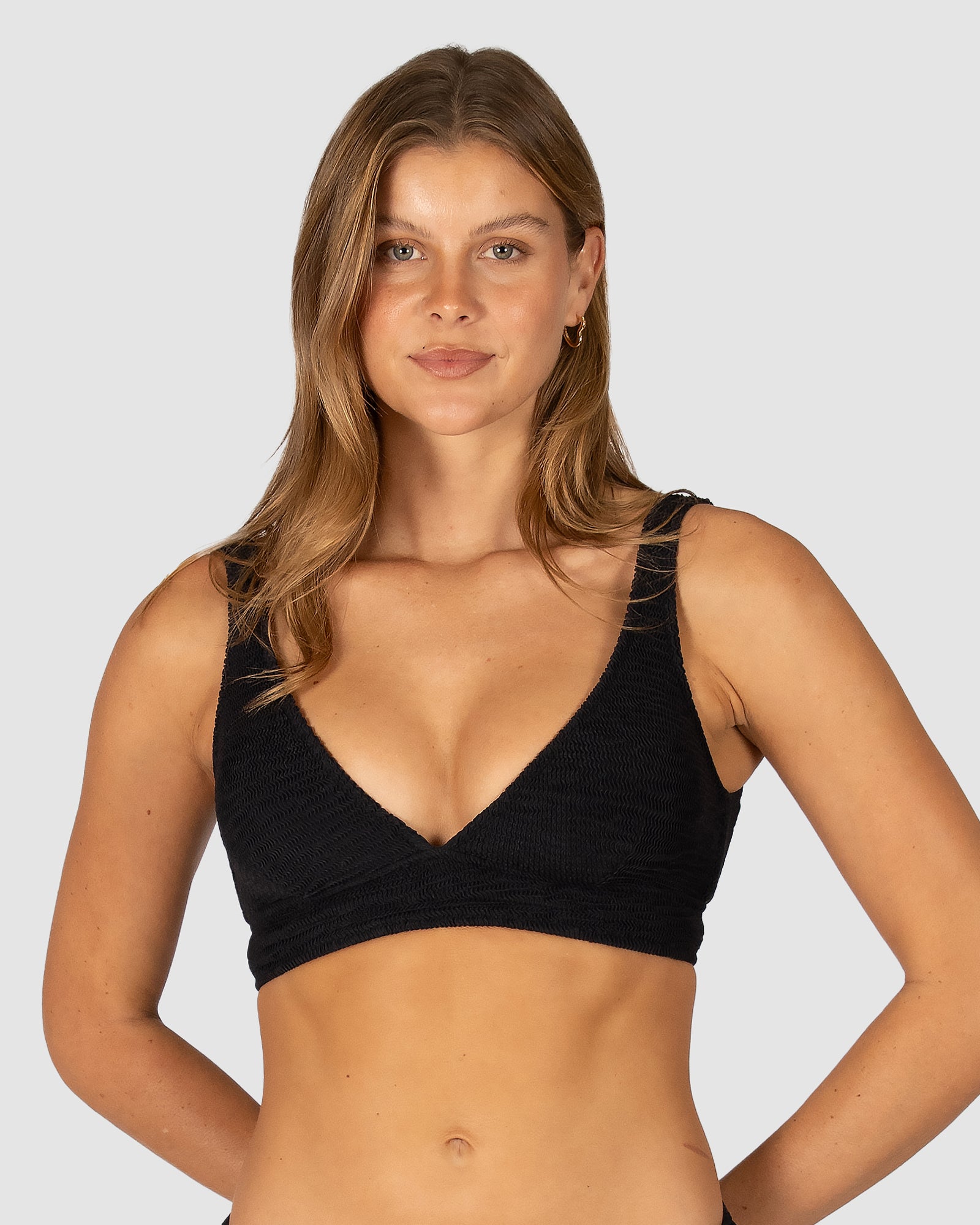 Ibiza D–DD Longline Bra Bikini Top in black crinkle fabric designed with dropped neckline, power mesh support under bust, boning, removable cups, and versatile straps by Australian swimwear brand Baku.