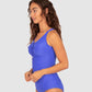 Baku is a premium Australian swimwear brand. The Rococco F/G Underwire Tankini Swim Top in Electric, a bold and vibrant cobalt blue, is made from Spanish textured fabrication that sculpts and supports. This tankini top features a flattering lace-up front, hidden underwire with power mesh stability, and boning. Wide, adjustable, and convertible straps ensure a flexible and secure fit, making it perfect for statement swimwear.
