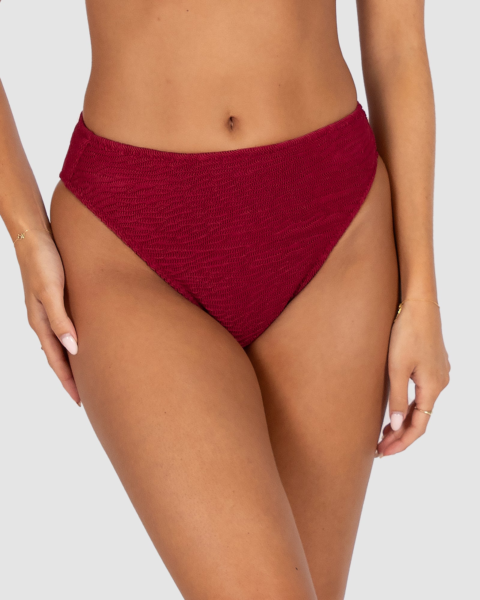 Ibiza High Waist Bikini Pant in scarlet crinkle fabric with high-rise fit, tummy control panel, and regular full coverage from Australian swimwear brand Baku.