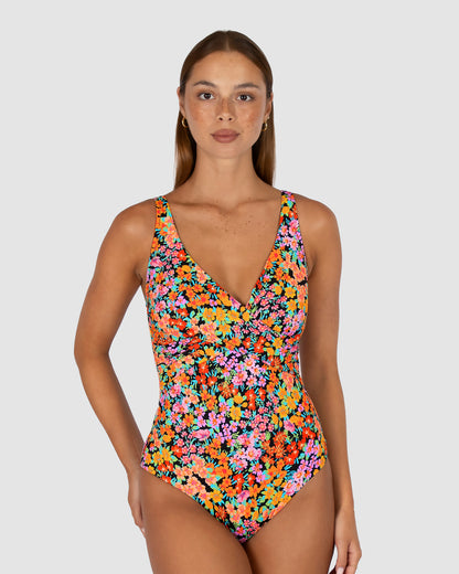 Biarritz wrap-style one-piece swimsuit with a draped front detail, dropped neckline, and hidden underwire for support.