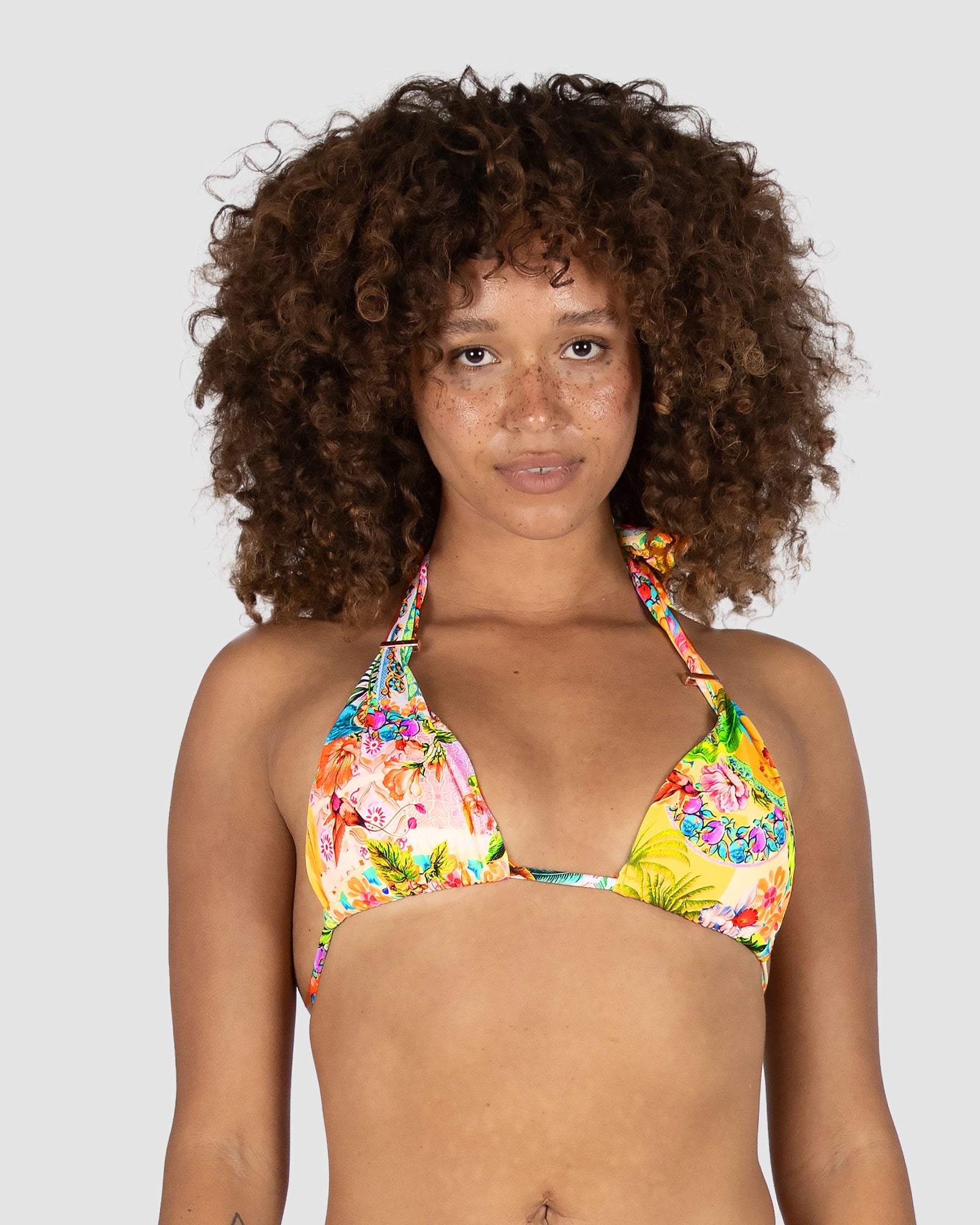 Baku Sardinia Grecian triangle bikini top with soft tie neck, rose gold bar trim and multi-fit cup design – bold tropical floral print