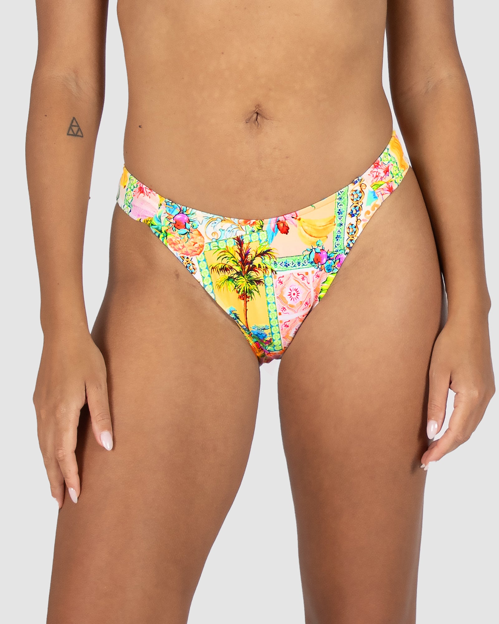 Baku Sardinia cheeky bikini bottom with soft tab sides and Rio coverage – tropical floral print, made in Australia