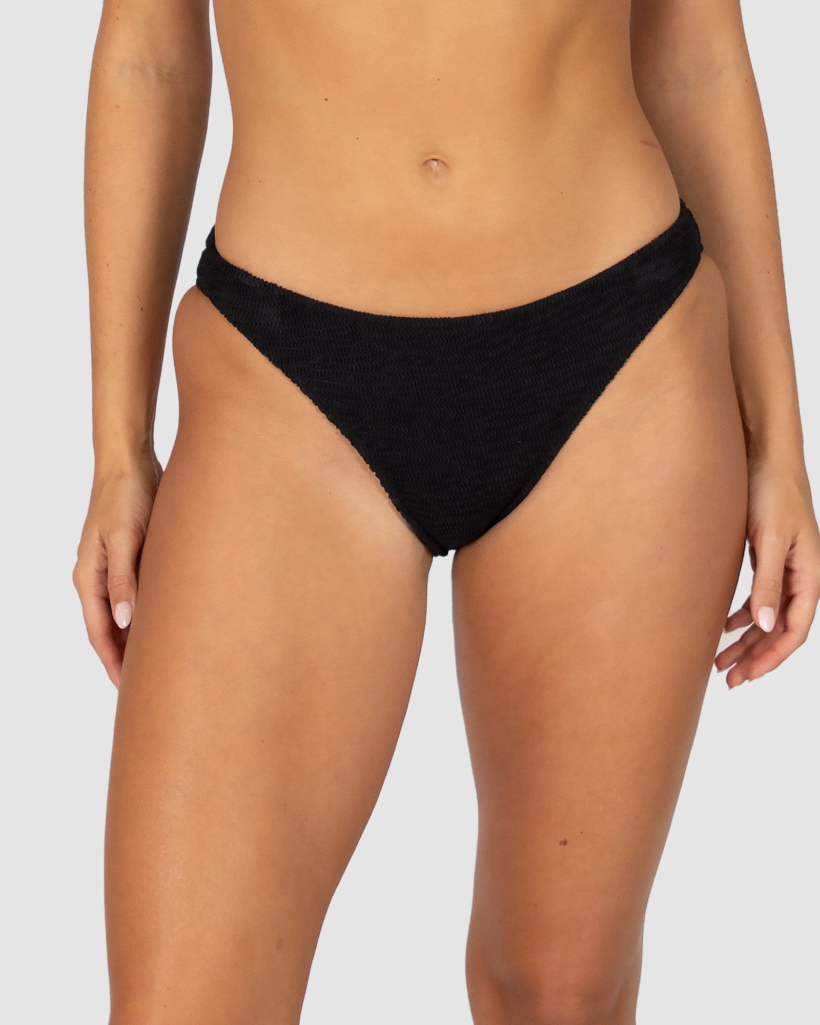 Ibiza Regular Bikini Pant in black crinkle fabric designed with soft edge front and comfortable regular coverage by Australian swimwear brand Baku.
