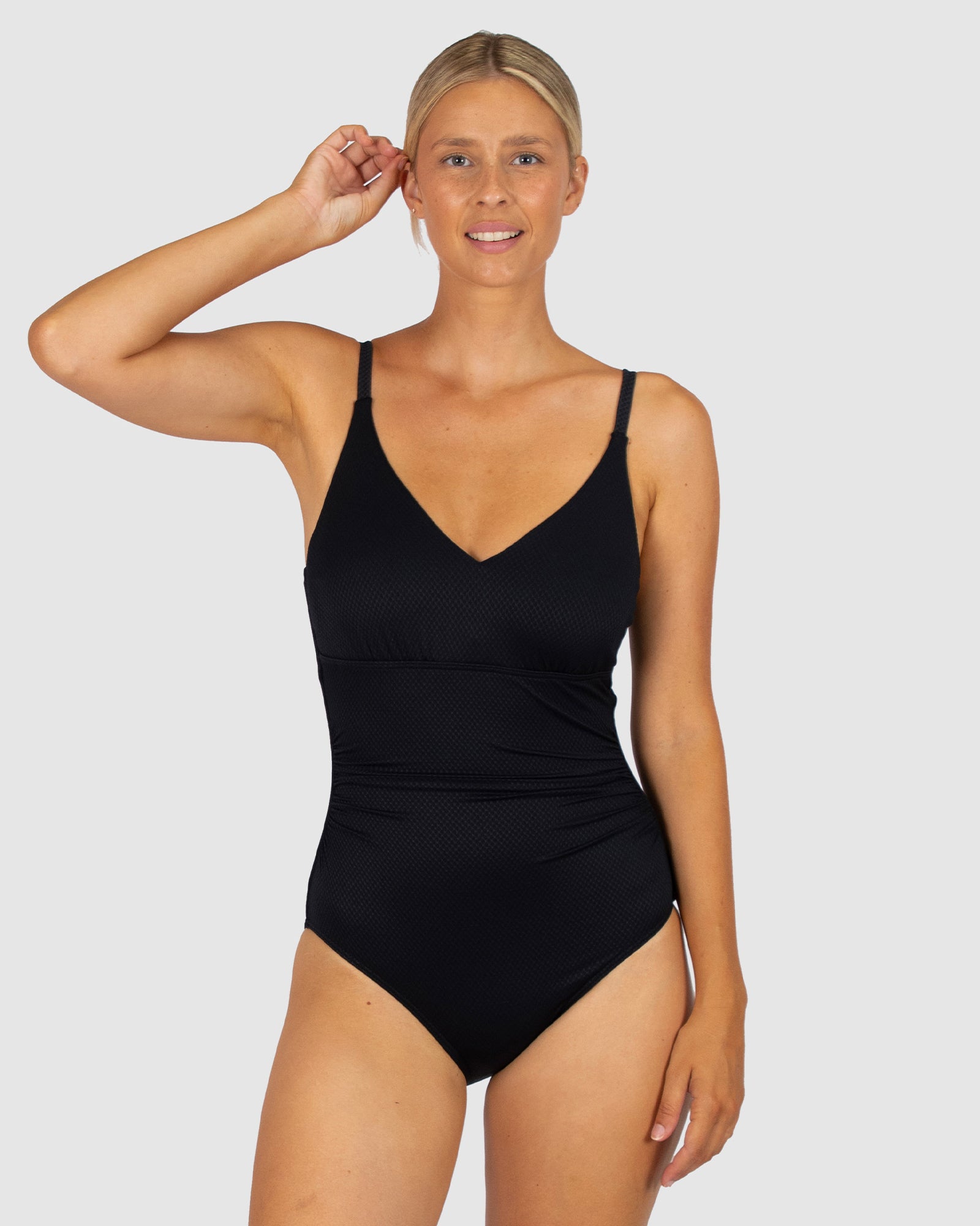 Baku is a premium Australian swimwear brand. The Rococco D/E One Piece Swimsuit in Nero, a timeless black shade, combines sleek sophistication with sculpting support. Featuring hidden underwire, side boning, tummy control, and removable cups, it’s finished with adjustable straps for a confident and elegant fit.