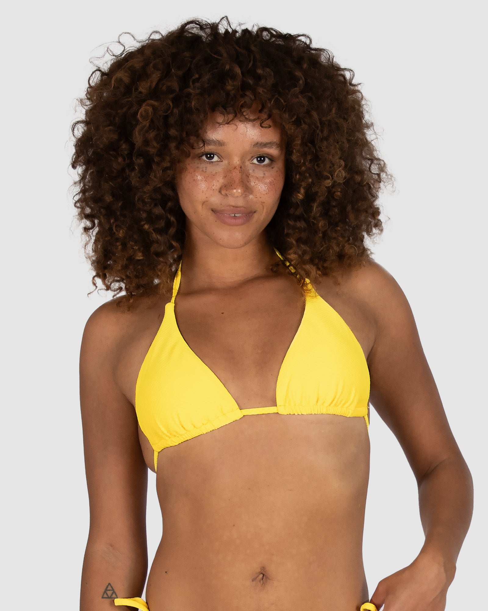 Baku's Rococco Slide Triangle Bikini Top in Sunshine – a vibrant yellow bikini with removable soft cups and adjustable tie straps. Made from buttery-soft Spanish textured fabric. Baku is an Australian swimwear brand.