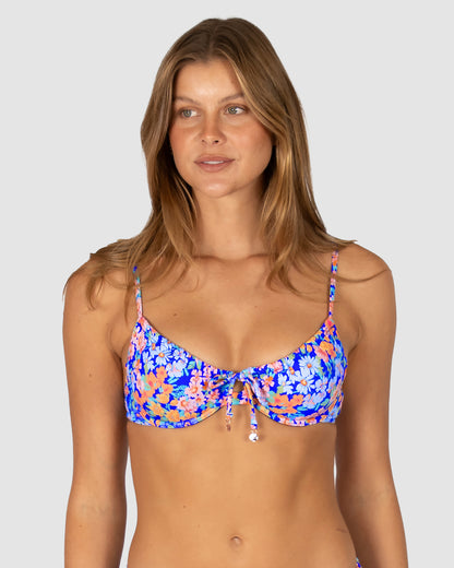 Biarritz floral print bikini top by Baku, designed with removable cups and flattering ruching for a feminine fit. Inspired by the French Riviera.