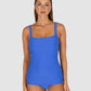 Baku is a premium Australian swimwear brand. The Rococco Multi Fit Singlet Top in Electric, a bold and vivid cobalt blue, is crafted from luxurious Spanish textural fabrication. Designed for A to DD cup sizes, it features removable cups, boning support, and adjustable, convertible straps for a supportive and flexible fit with a vibrant, energetic look.