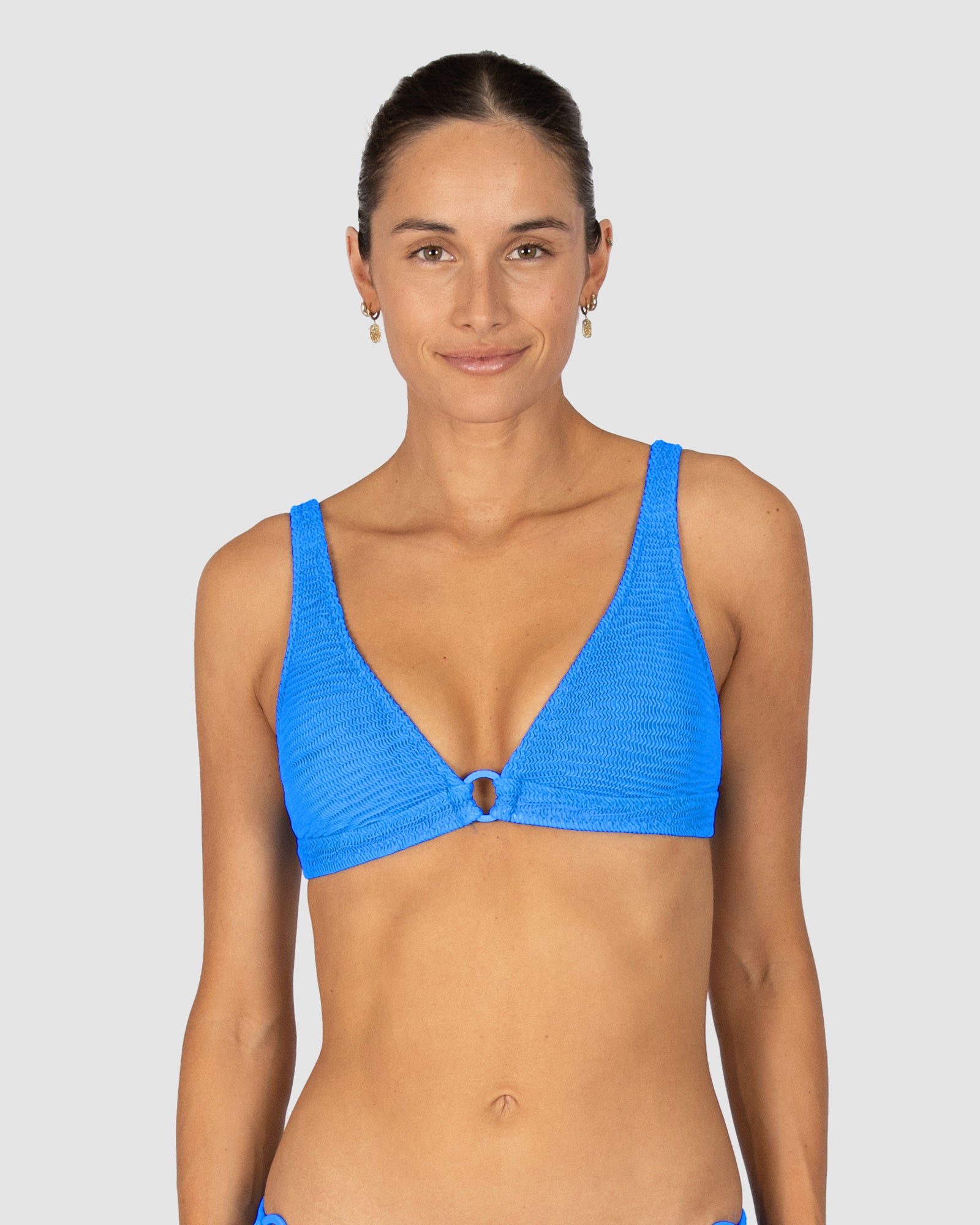 Ibiza Ring Front Bra Bikini Top in blue crinkle fabric featuring ring front design, removable cups, supportive boning, and adjustable straps by Australian swimwear brand Baku.