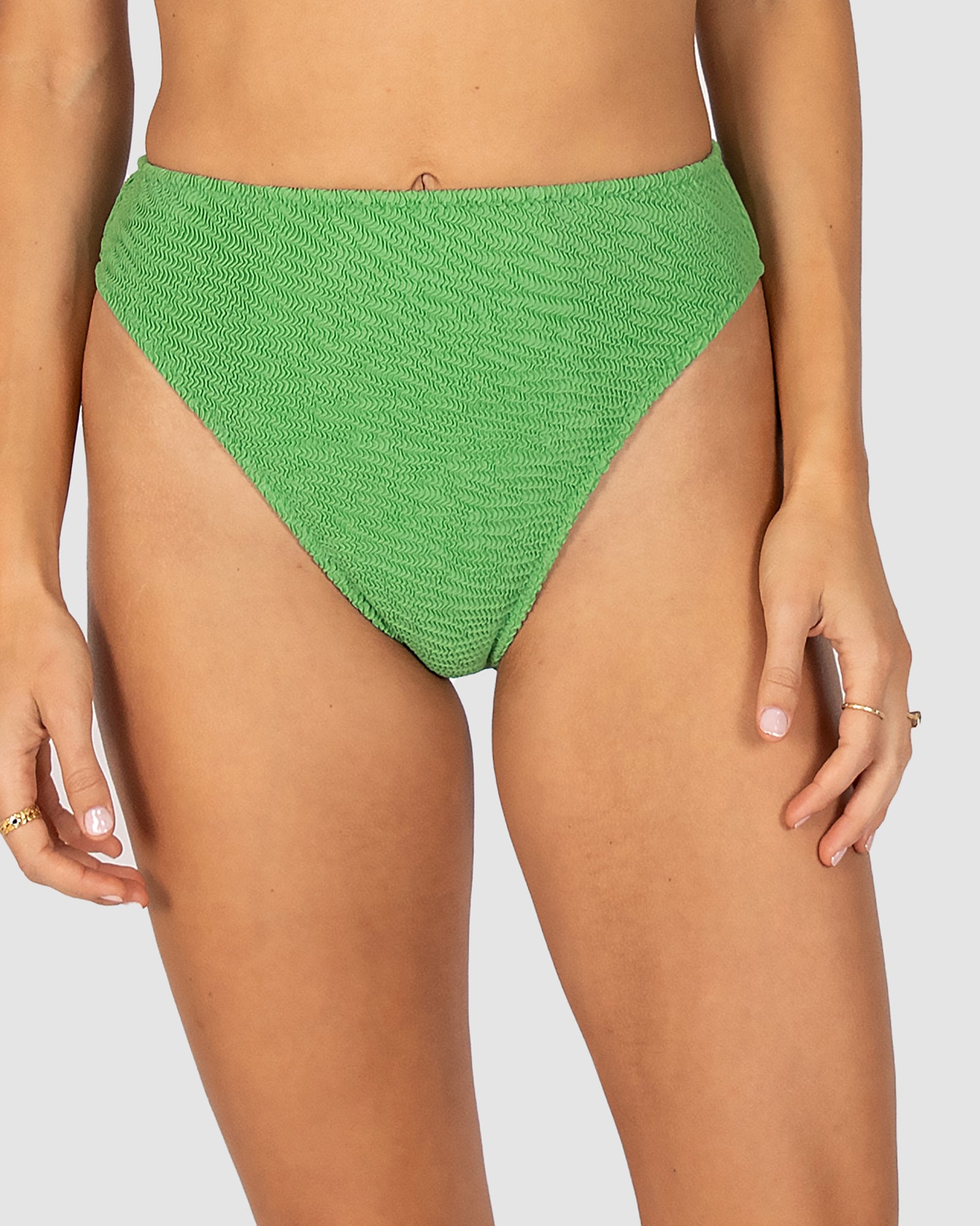 Ibiza High Waist Bikini Pant in moss crinkle fabric offering flattering high waist, tummy control design, and regular coverage from Australian swimwear brand Baku.