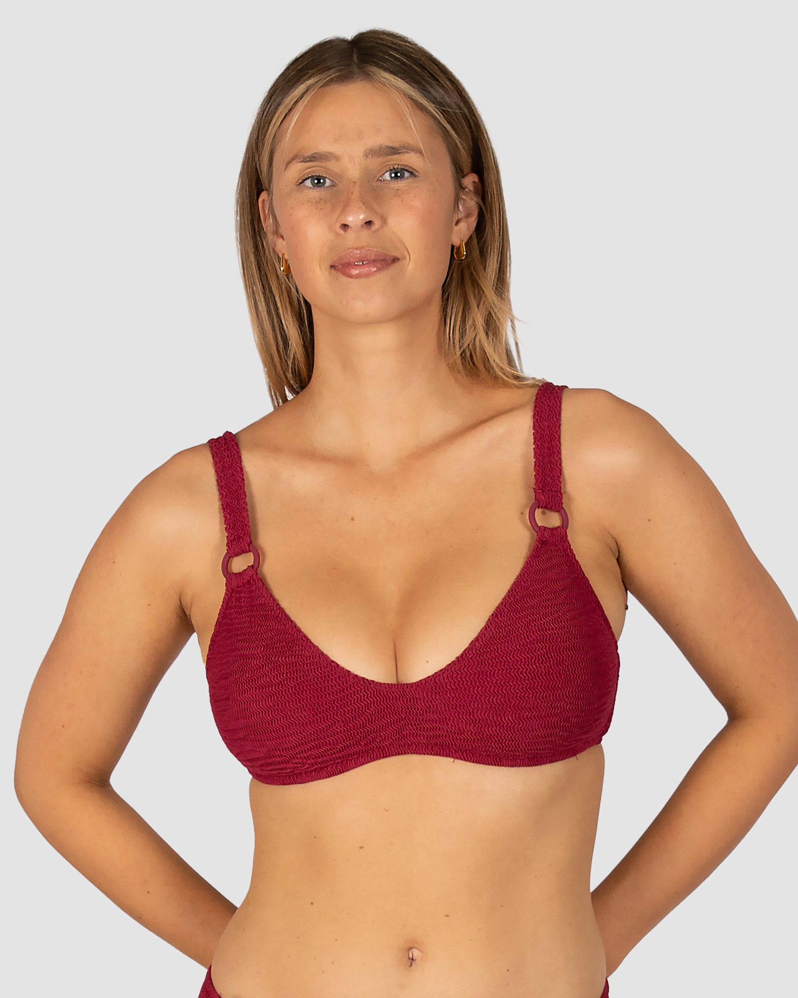 Ibiza Scoop Bralette Bikini Top in scarlet crinkle fabric with scoop neck, ring trim, removable cups, and clip-back fastening from Australian swimwear brand Baku.